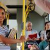 woman on bus with books