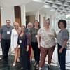 A photo of the Minnesota team at a 2025 gathering